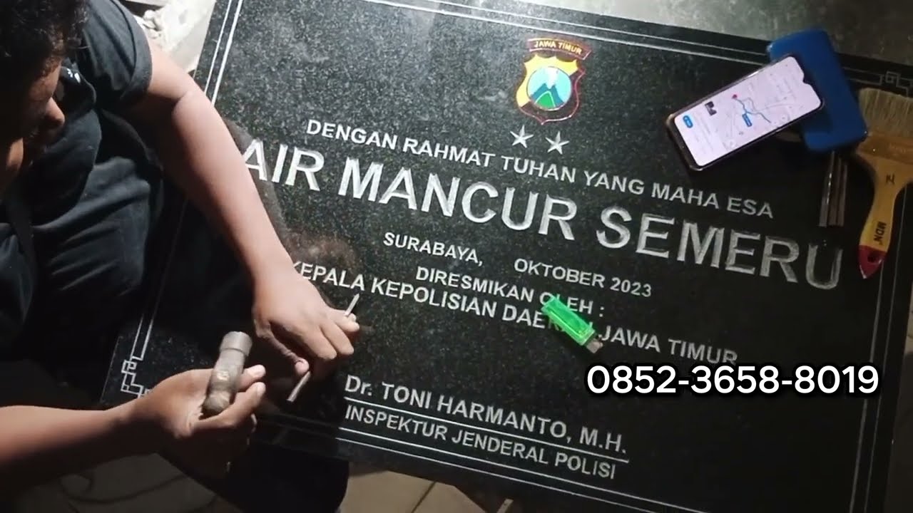 proses grafir prasasti peresmian gnatit hitam