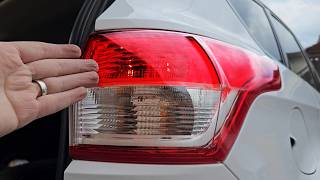 Ford Kuga - How to change the rear brake light bulb