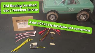 Axial SCX24 brushed esc and flysky Noble nb4 compatible receiver in one fitting guide.