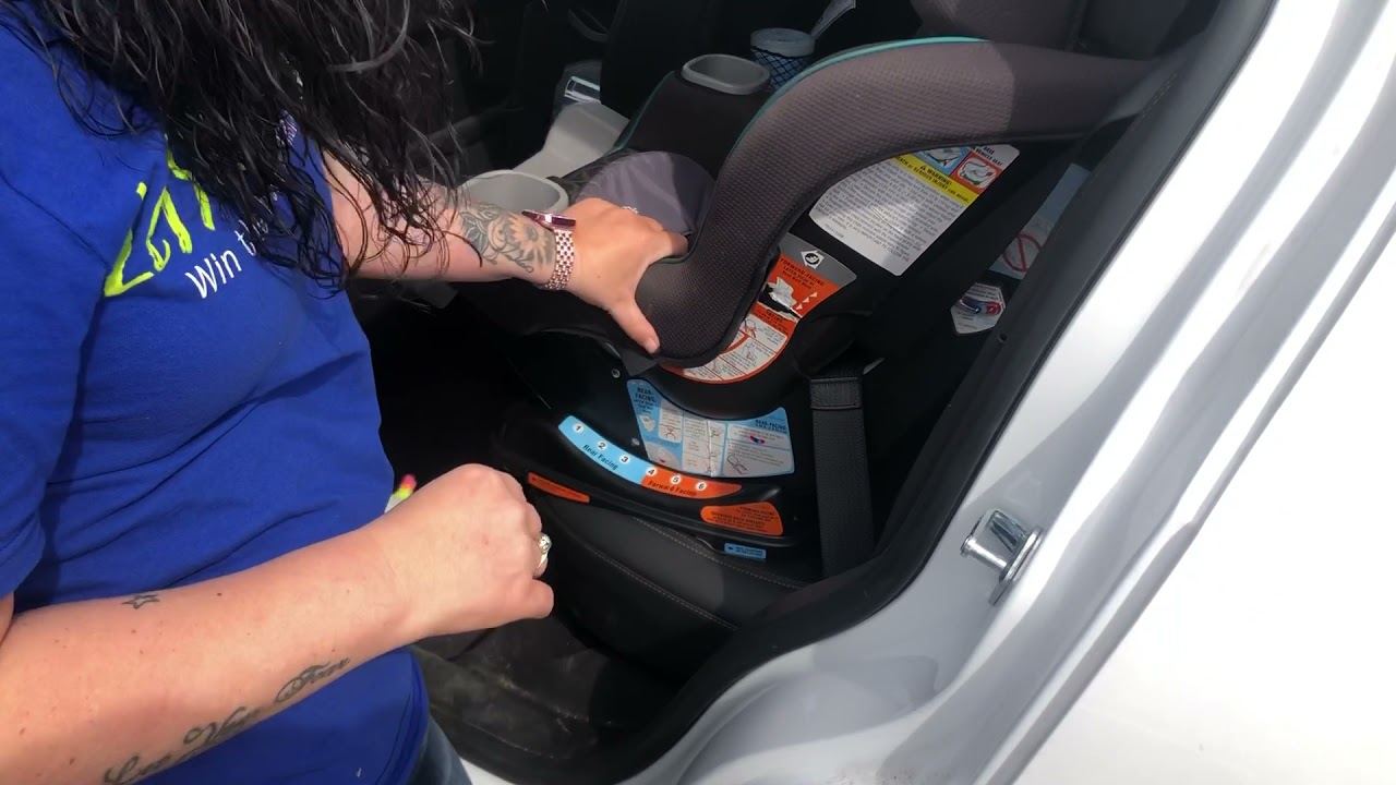 How to safely install a car seat with a seat belt. (English) YouTube