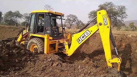 JCB Backhoe Machine installing Culvert Pipe in Drain and Felling Soil-JCB 3dx Road Construction JCB