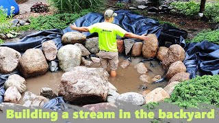 Building a stream in the backyard in Eagan. Aquascape Pond De-icer  manual. by Team MnWaterscapes 1,156 views 1 month ago 6 minutes, 24 seconds