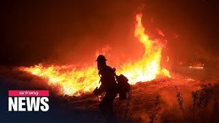 Massive wildfire in southern california continues to rage amid
scorching heatwave