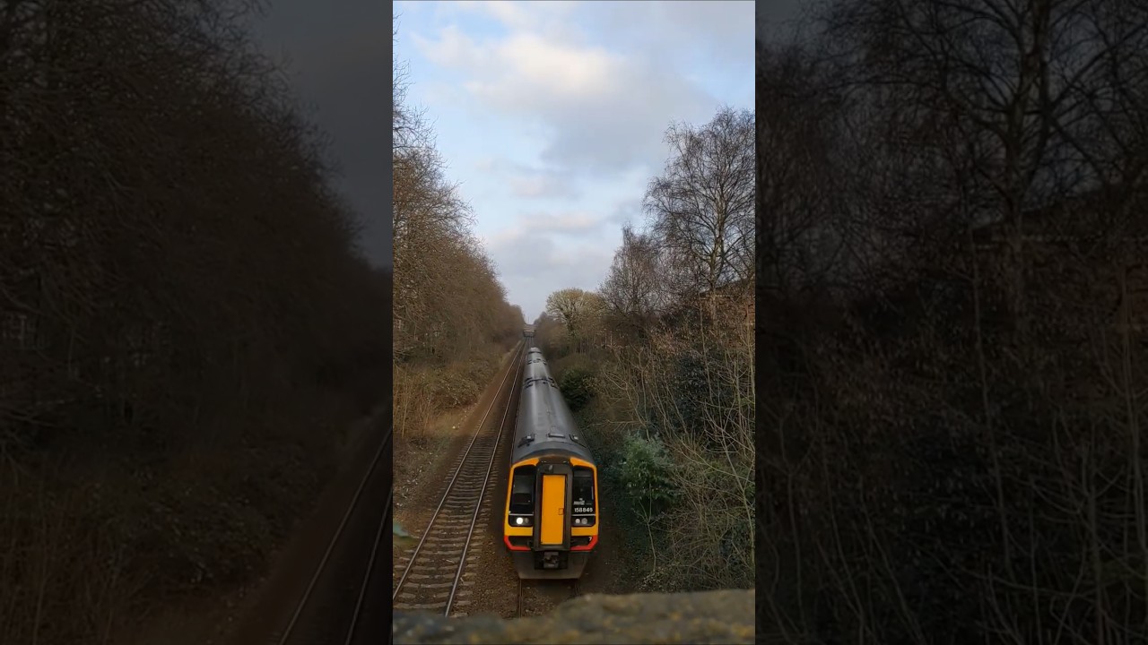 Class 158 speeds through Urmston with a 2 tone squeaker! 