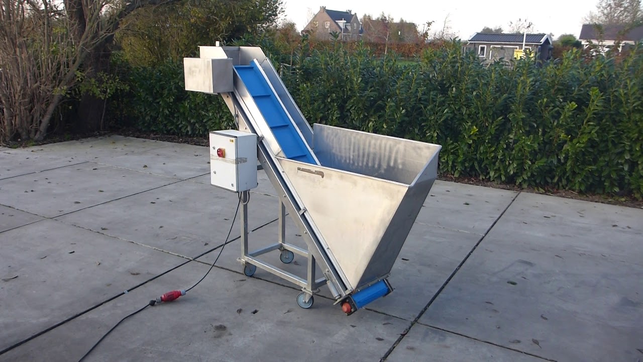 RVS opvoerband gebruikt met meenemers