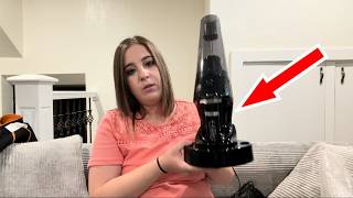 Unbox and set up this handheld vacuum