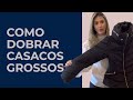 Como dobrar e guardar casacos de frio