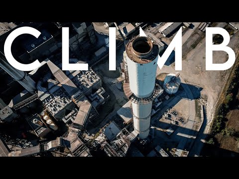 We climbed a towering smokestack while security patrolled below.
