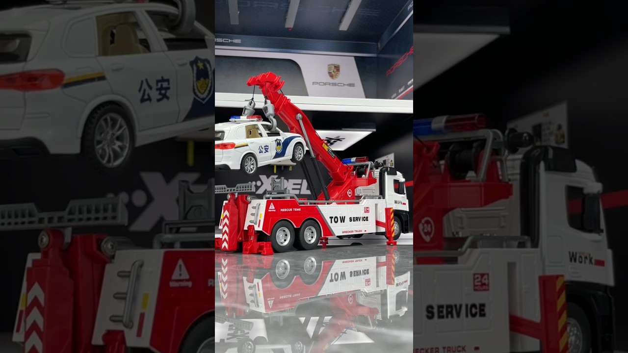 The alloy tow truck with sound and light is coming towards you. 