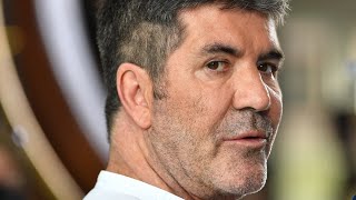Simon Cowell Hospitalized With Broken Back