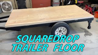 building the floor for our cheap camper trailer