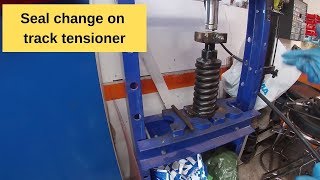 Track tensioner seal change on mini excavator