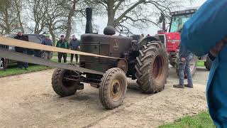 Field Marshall running a Ransomes Sims & Jeffries threshing machine and stationary baler