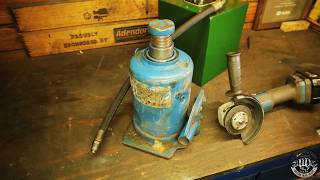 Modifying a hydraulic jack to work with a manual power pack