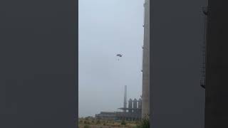 Guy Base Jumps from an Old Chimney