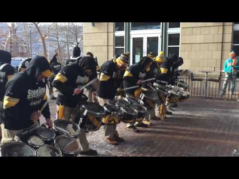 Steelers drum line revs up freezing fans for playoff game