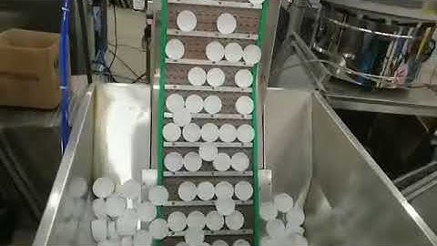 Automatic cap wad assembly machine