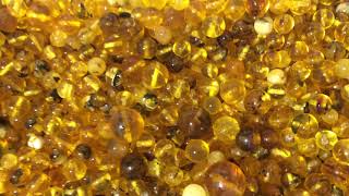 drilled amber balls. https://amberis.ru/  baltic amber.  янтарь.kehribar. كهرمان. अंबर. âmbar.