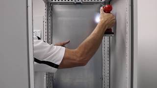 Installing a partition wall between bayed TS 8 large enclosures