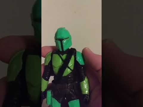 Star Wars painted mandalorian figure named Aaron sim.