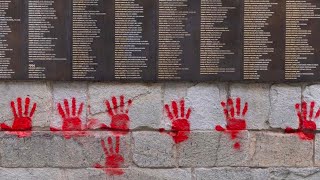 Des mains rouges taguées sur le Mur des Justes du Mémorial de la Shoah