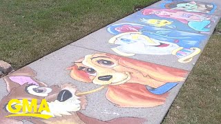 Brian morris, an artist and construction worker, uses chalk to feature
a different disney movie on each sidewalk square in front of his home
during the covid...