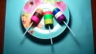 Making of colorful lollipops from play-doh