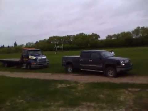 tow truck gets towed - YouTube