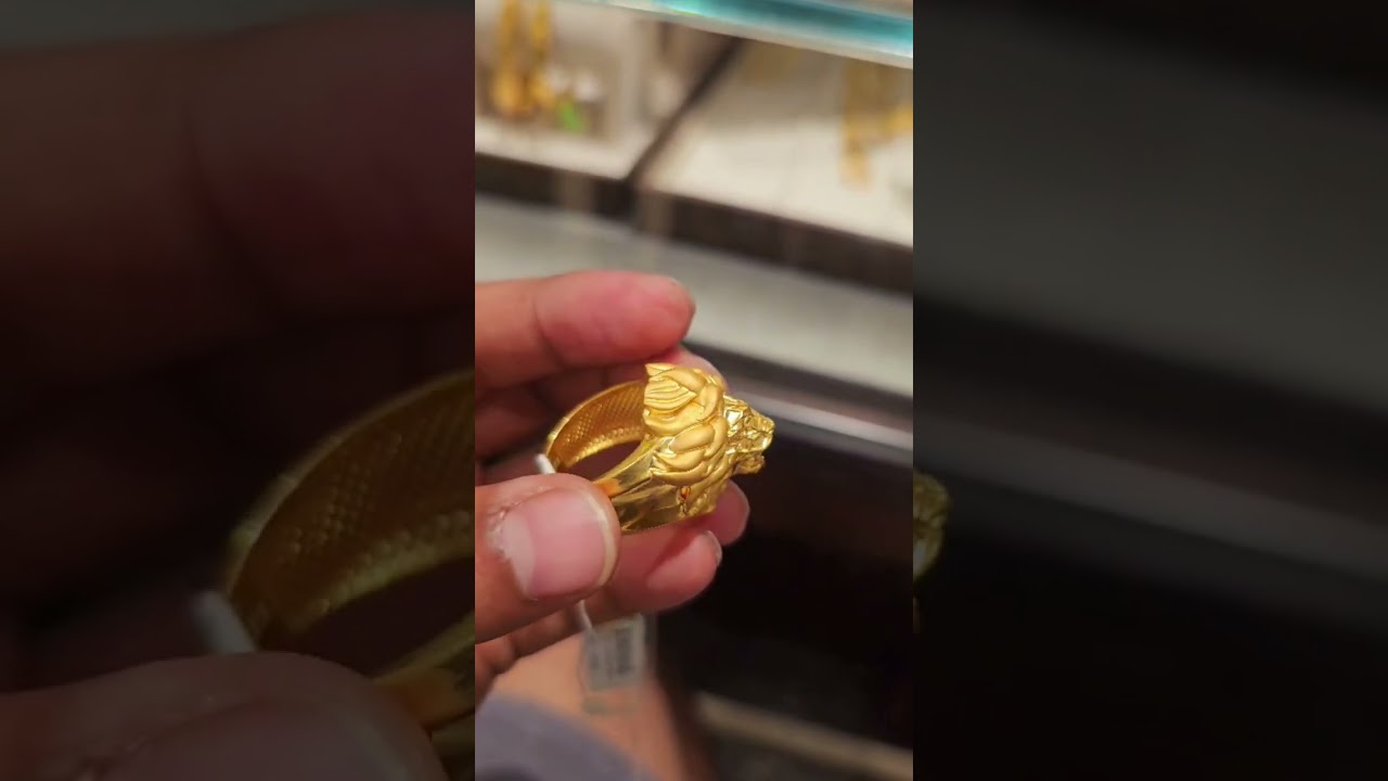 Gold lion ring design for gents|