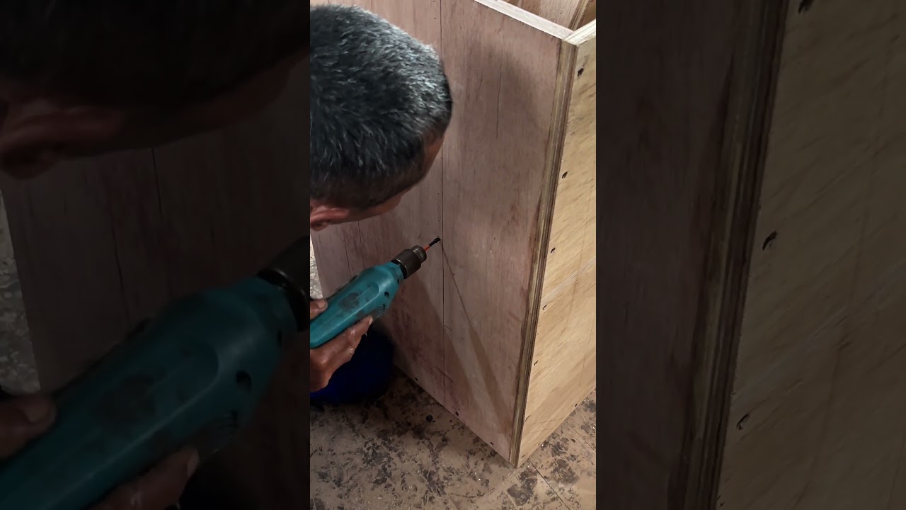 installing screws on the frame of the w-bin speaker box variation 