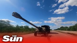 Ukrainian soldiers fire captured Russian military Howitzer