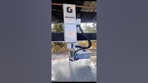 4 axis bridge saw cutting granite slabs in Morocco