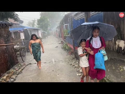 Rainy Day Walk through a Village with Congested Houses and Narrow Path