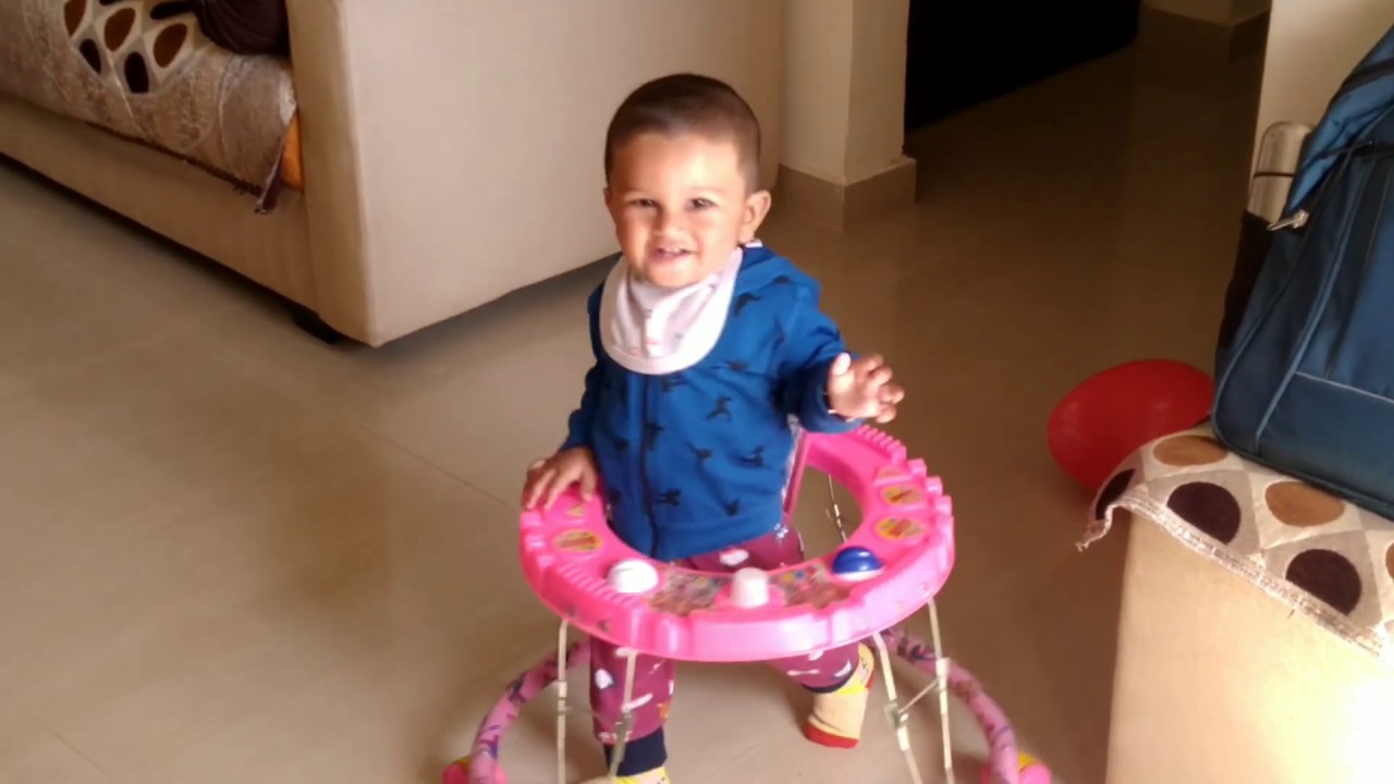 Baby in Walker/8 month baby enjoying in walker/Walker