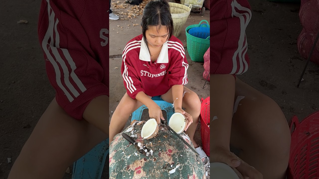 Thai girl peeling coconut balls - Fruit Cutting Skills