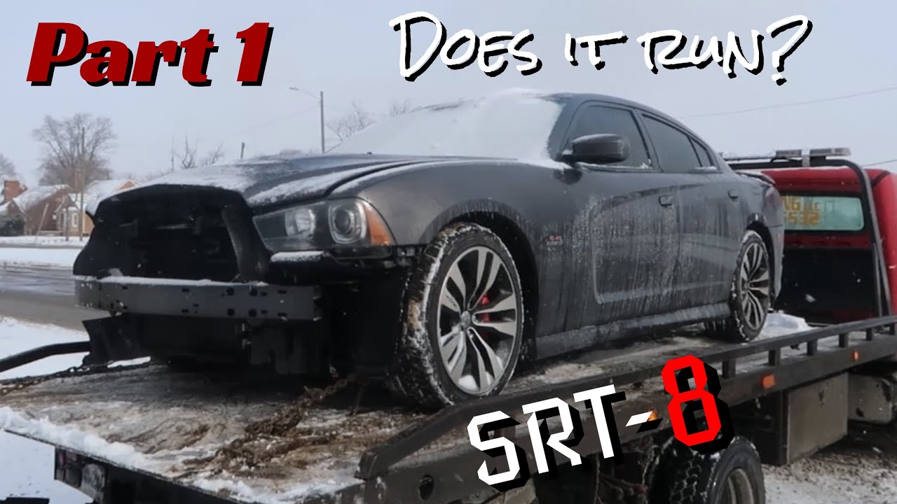 REBUILDING A WRECKED 2013 DODGE CHARGER SRT8 (PART 1)