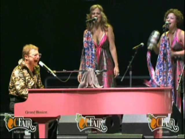 Kenny Metcalf as Elton