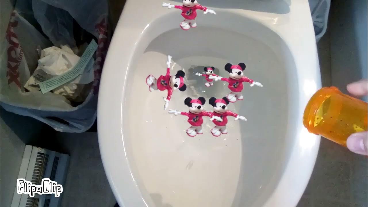 Watch Mickey Mouse get flushed down the toilet YouTube