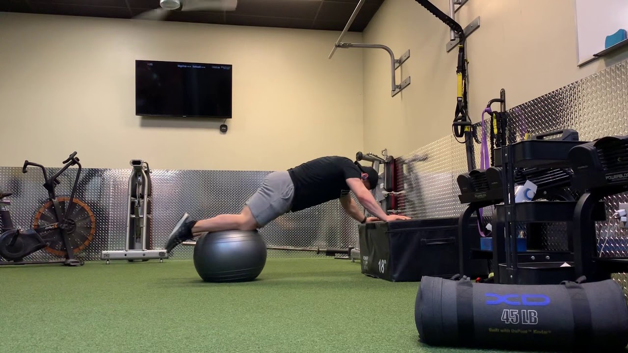 Elevated Knee Tuck to Body Saw on Swiss Ball YouTube