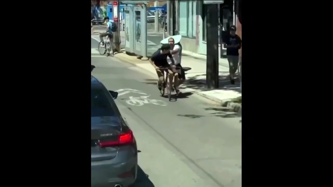 Altercation caught on camera between cyclist and motorist in downtown ...