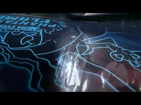 .	“Opening a Mega Evolution: Phantasmal Flames ETB 🔥 Did I Pull a Mega?”