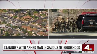 Deputies in standoff with armed man in Saugus