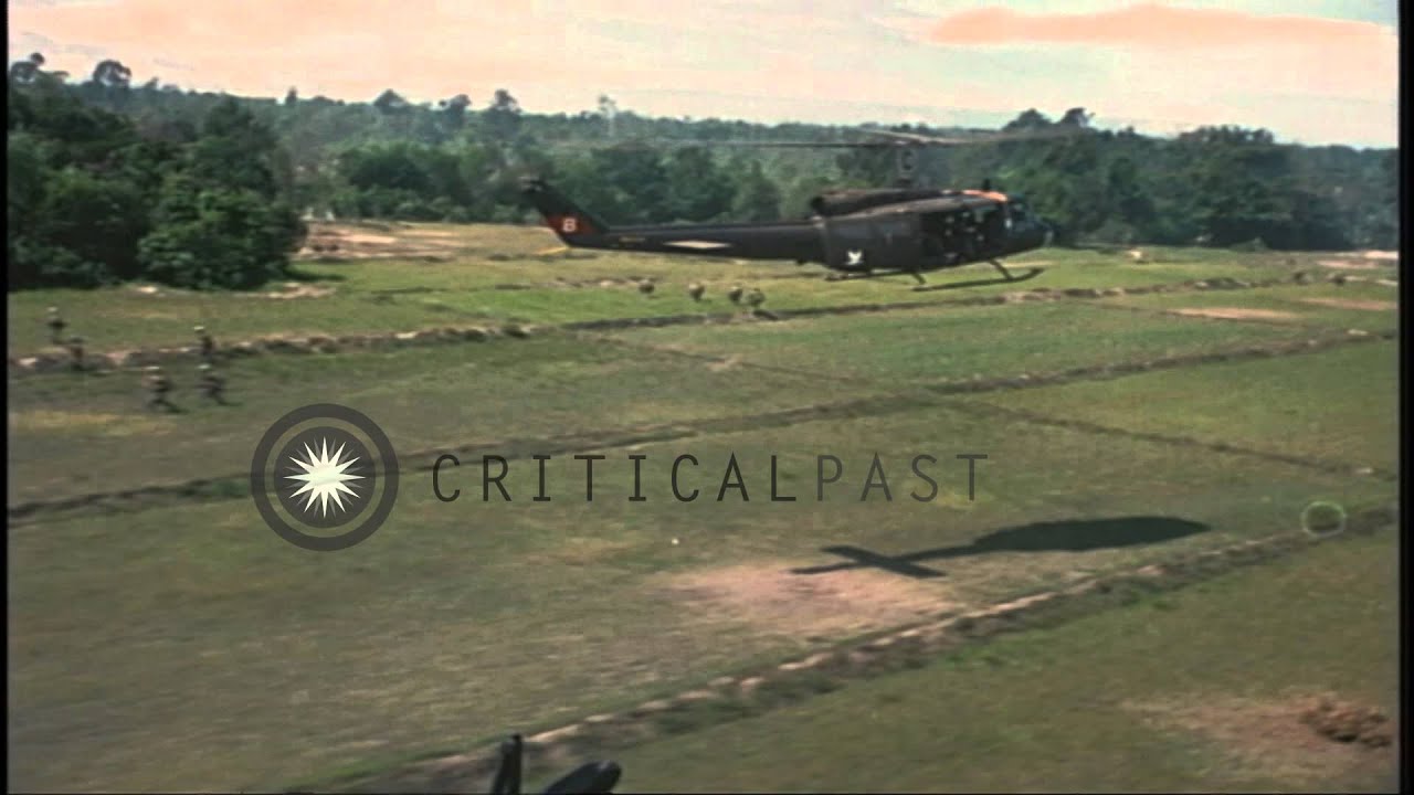 US 2nd Battalion, 14th Infantry, 1st Brigade soldiers disembark from UH-1D Huey h...HD Stock Footage