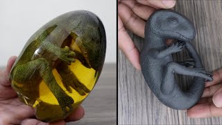 How to Make Dinosaur in Amber | Resin Art
Materials:
Clear transparent plastic egg
Cardstock Paper
Polymer clay
Aluminum foil
Sand (in a cup)
Craft wire
Wire cutter
Nose plier
Paint brush
Acrylic paints
Ocher
White
Black
Purple
Crimson
Chromium oxide green
Raw umber
Super Glue / UV Resin
Hot Glue Gun
Disposable cup
Epoxy resin + Epoxy Hardener 300g
Transparent amber resin dye
Craft stick
Gloves
Mask
Safety glasses
Tools:
Craft knife
Paper cutter
Clay tool
Digital scale
Hot air gun
#Amber
#ResinArt
#Dinosaur How to Make Dinosaur in Amber | Resin Art
