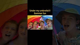 “Rainbow Umbrella Concert with My Kids! 🎤🌈” #momlife #umbrella #songs #parenting #funnyvideo
