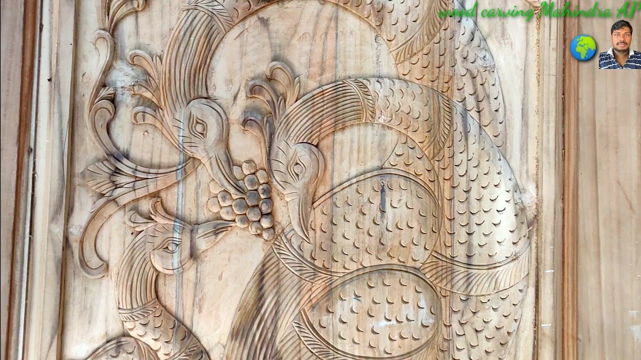 wood carving Beautiful design peacock wonderful design main door ...