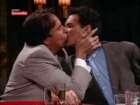 Norm Macdonald gets some kisses from Kevin Nealon