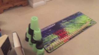 A bopit knocks a domino trick set