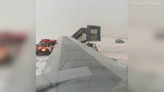 Footage shows aftermath of Boeing 737 skidding off an icy runway