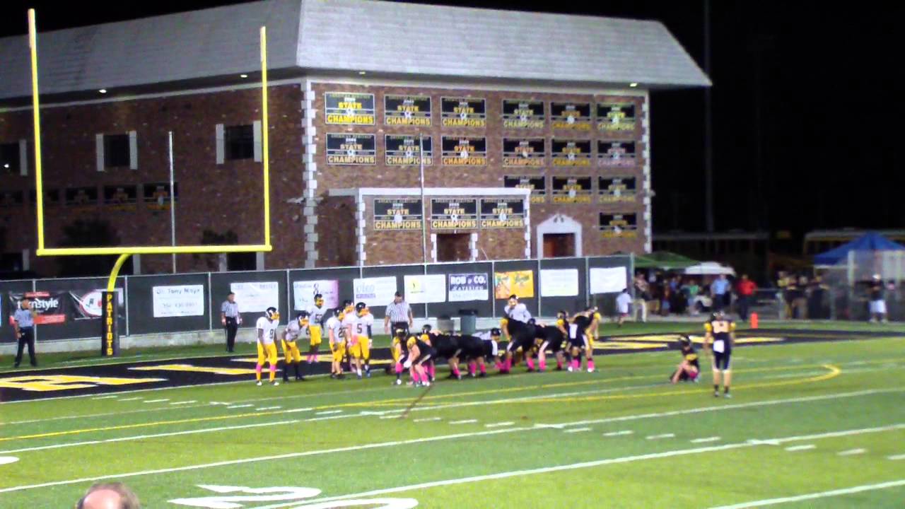 Crazy football player Player jumps over HUGE Olineman to block Field